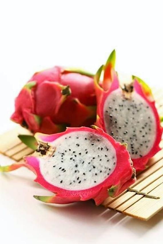 Freshly cut White Dragon Fruit showing white pulp with seeds